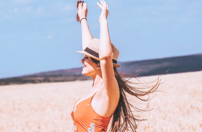 Canva - Photo of Woman Raising Her Both Arms