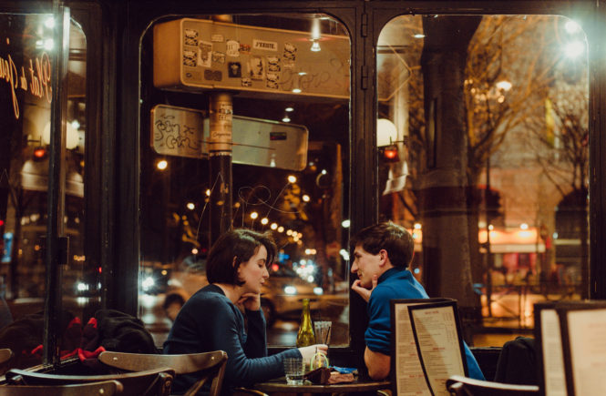 Canva - Selective Focus Photography of Man and Woman Sitting on Chair Inside Restaurant during Nighttime (1)